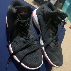 Size 10 1/2 champion shoes black white red , like new
